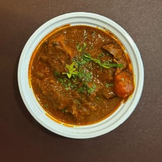 Chef’s Special Goat Curry – Traditional Bone-In Mutton Masala